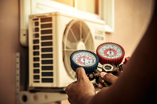 Professional Air Conditioning Service technician working in Avoca, PA
